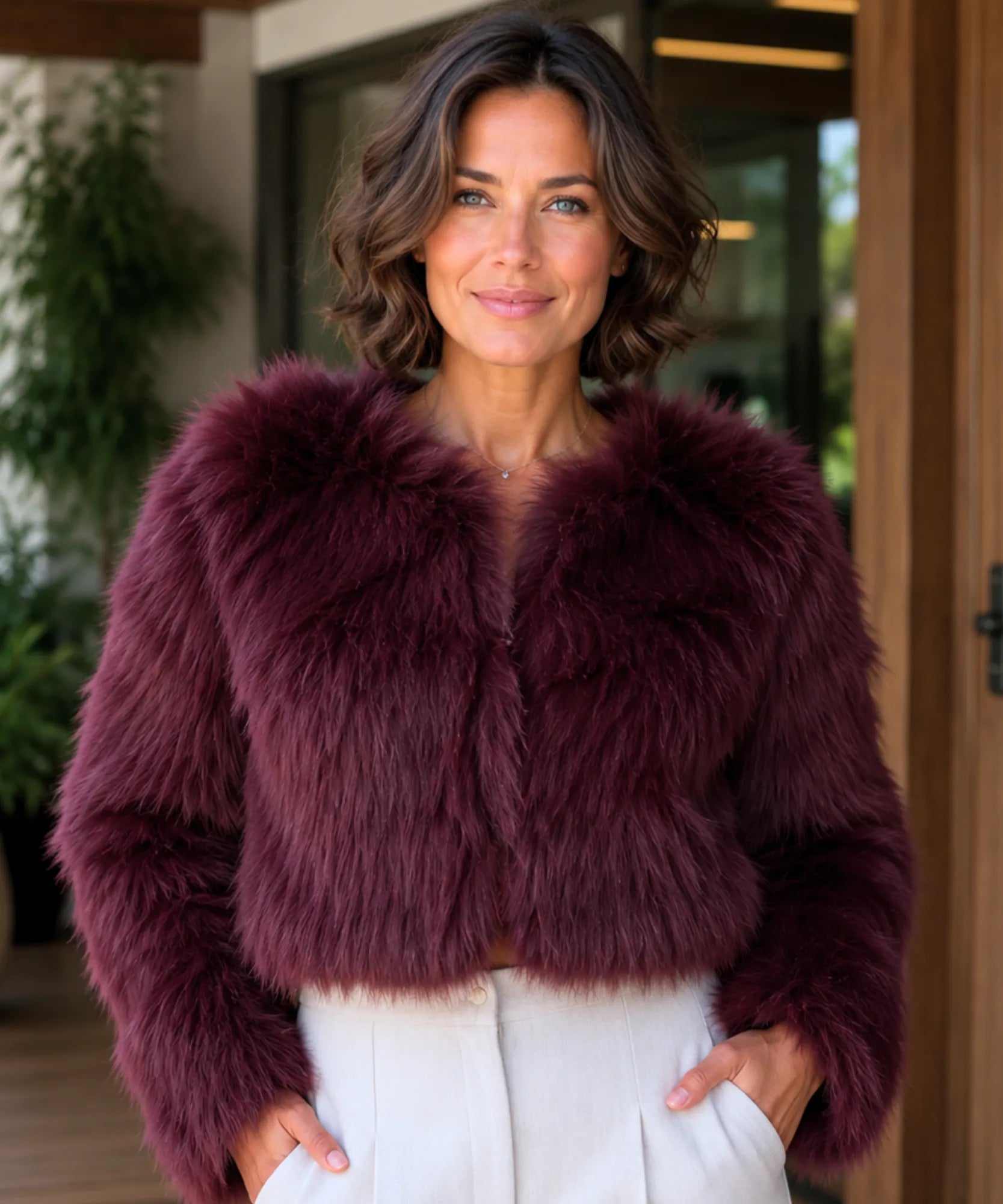 Women's short vegan fur jacket in burgundy