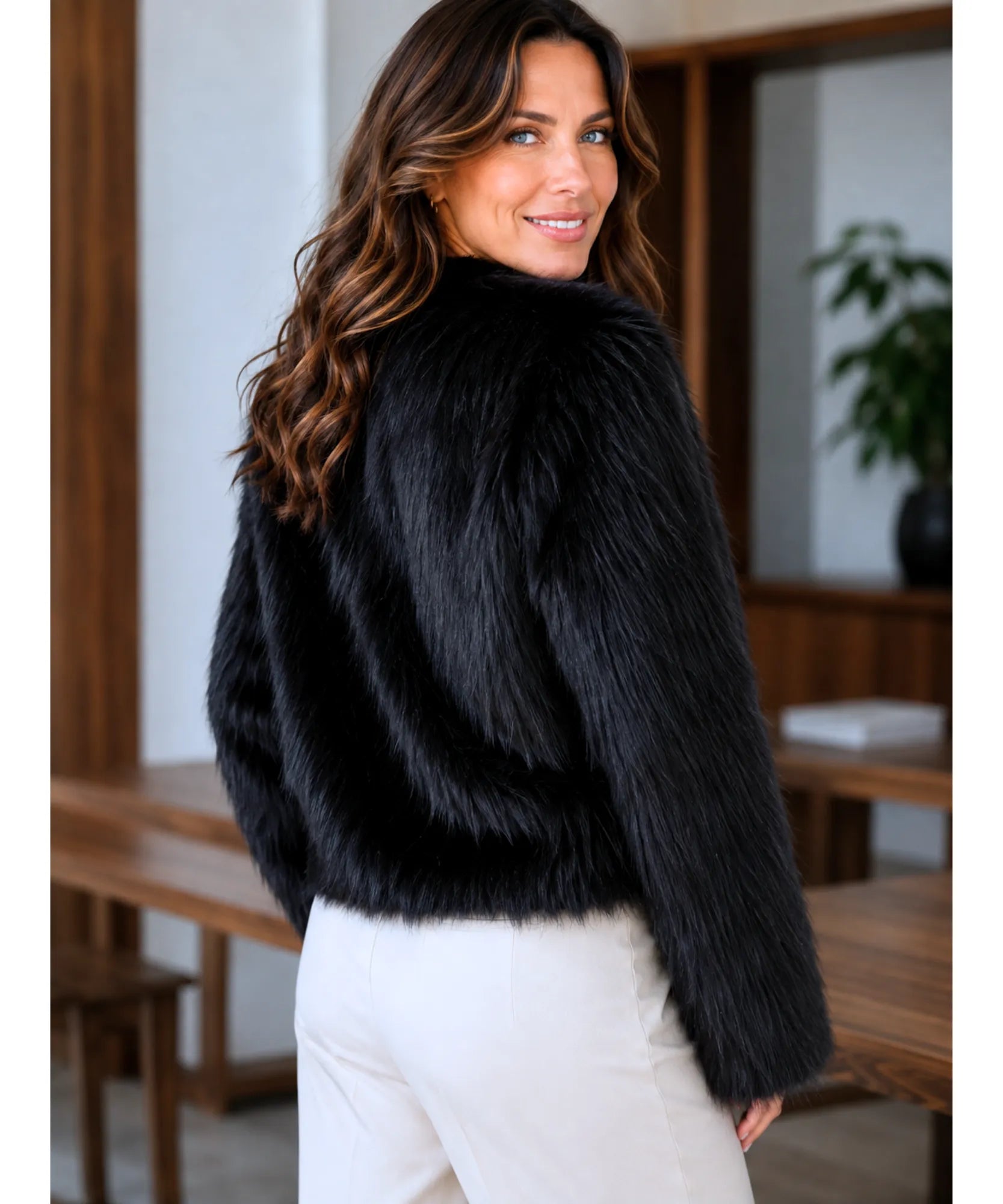 Women's short fur jacket in black, front view