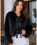 Women's short fur jacket in black