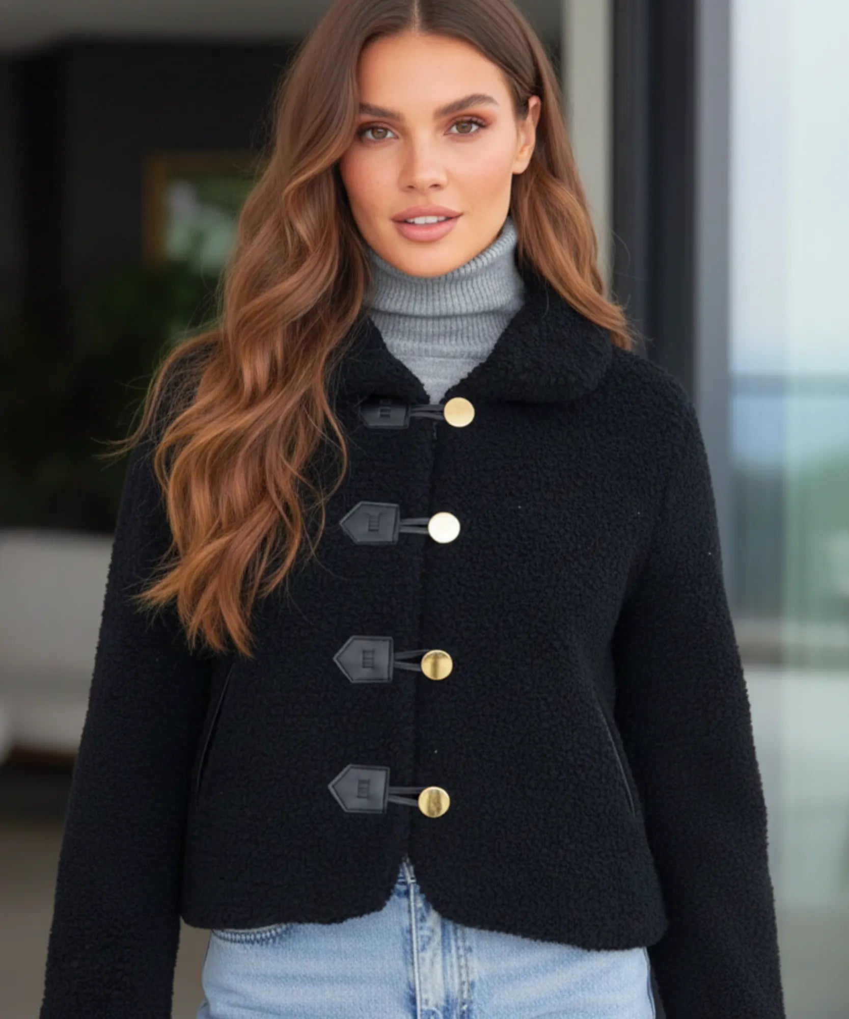 Women's teddy coat in black, side view