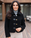Women's teddy coat in black, front view