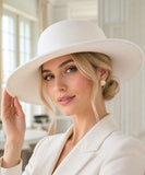 White wide-brim gaucho hat, close-up view