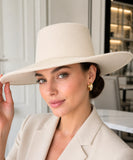 Woman wearing an Ivory wide-brim gaucho hat