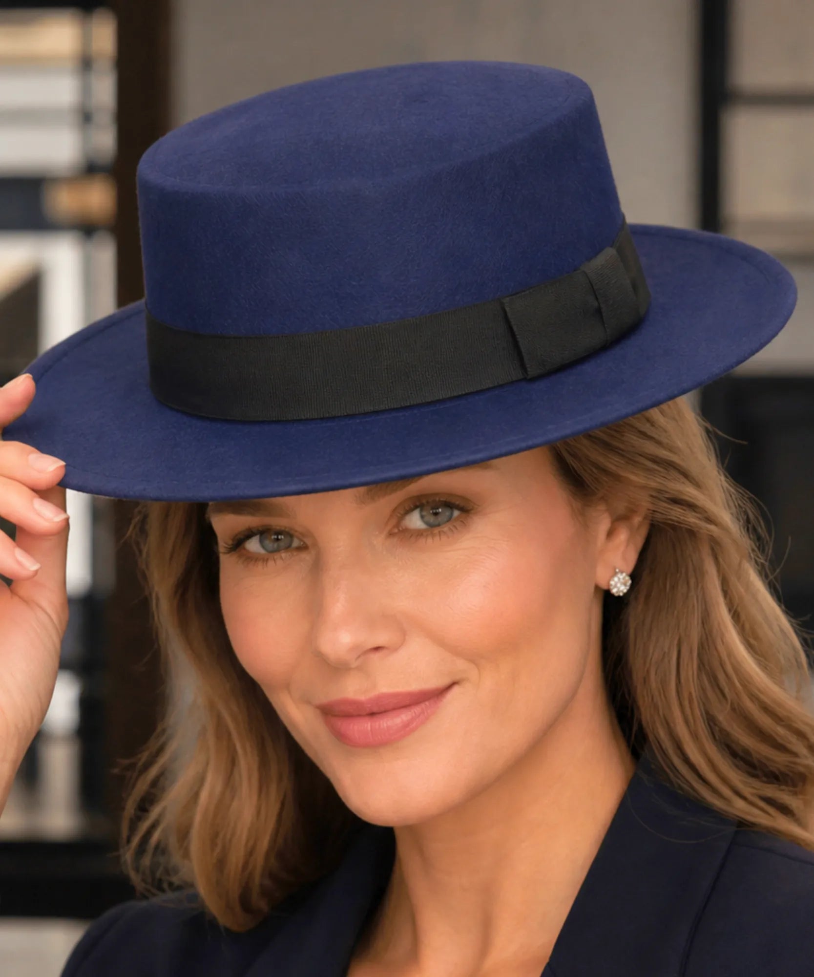 Navy wool felt pork pie hat, close-up view