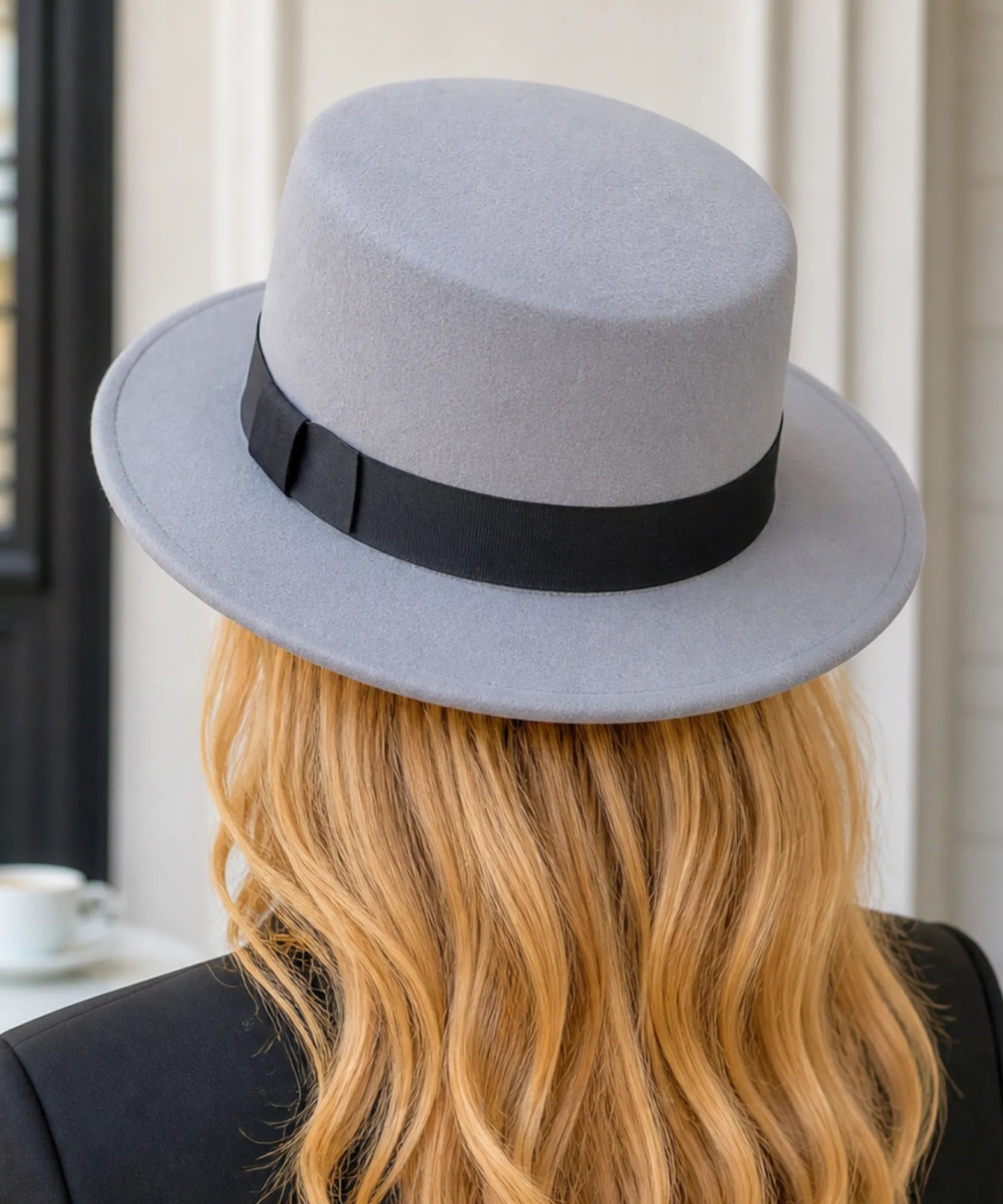 Woman wearing a Silver wool felt pork pie hat