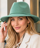 Woman wearing a Sage Green wide-brim suede western hat