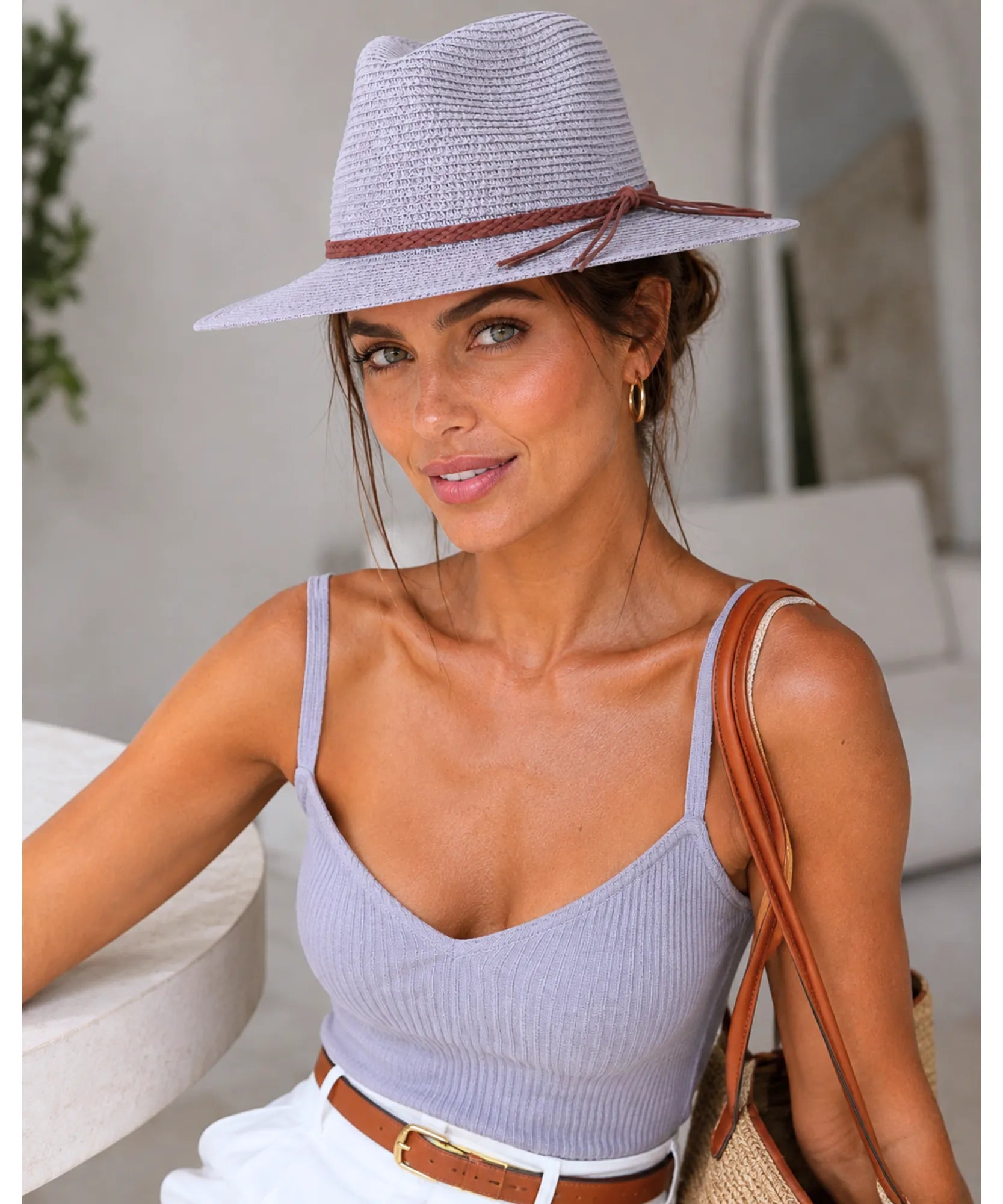 Women's straw panama hat in grey with a braided cord tie
