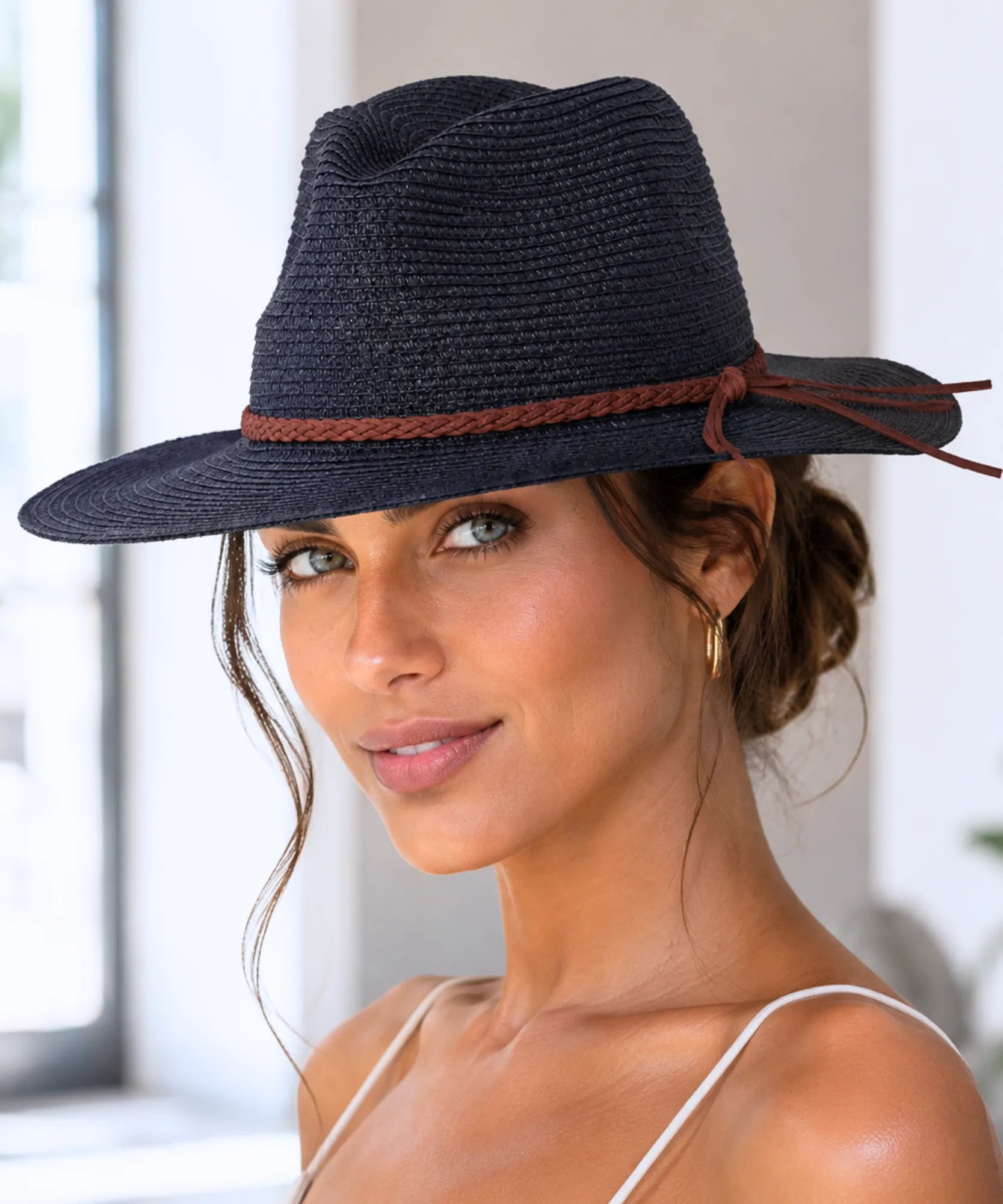 Women's straw panama hat in black with a braided cord tie