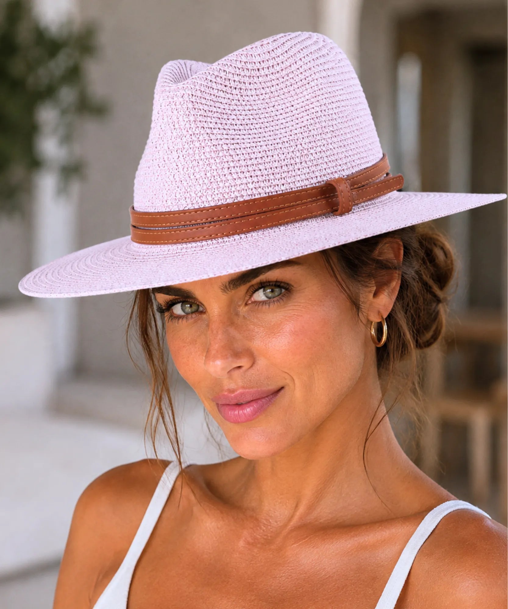 Unisex wide-brim straw fedora hat in hot pink, side view