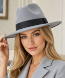 Woman wearing a Silver wool felt fedora hat, front view