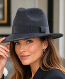 Woman wearing a Silver wool felt fedora hat