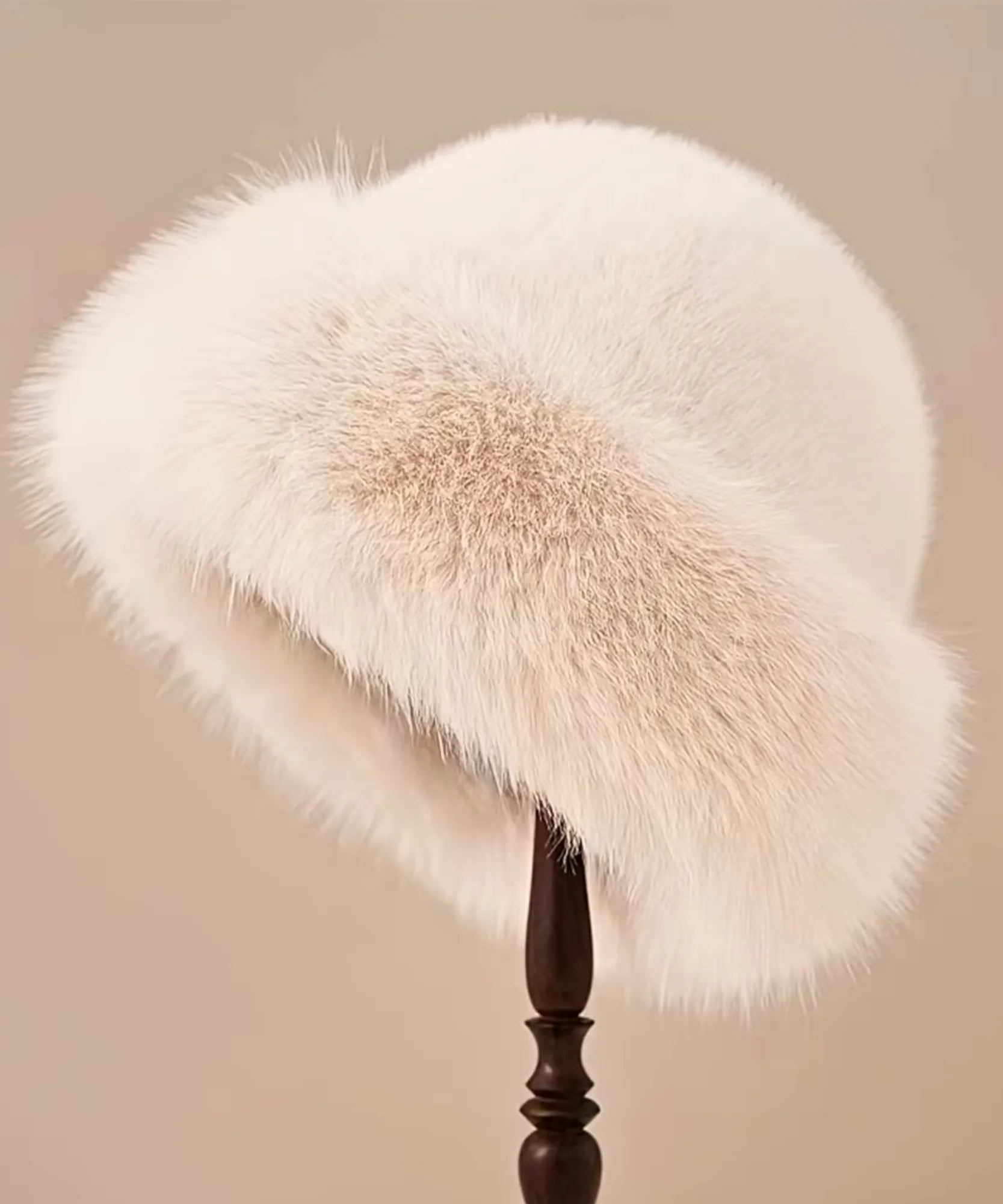 Ivory fur hat with a flannel lining, close-up view