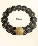 Women's black concho belt with studded medallions laid flat, 45.3 in length