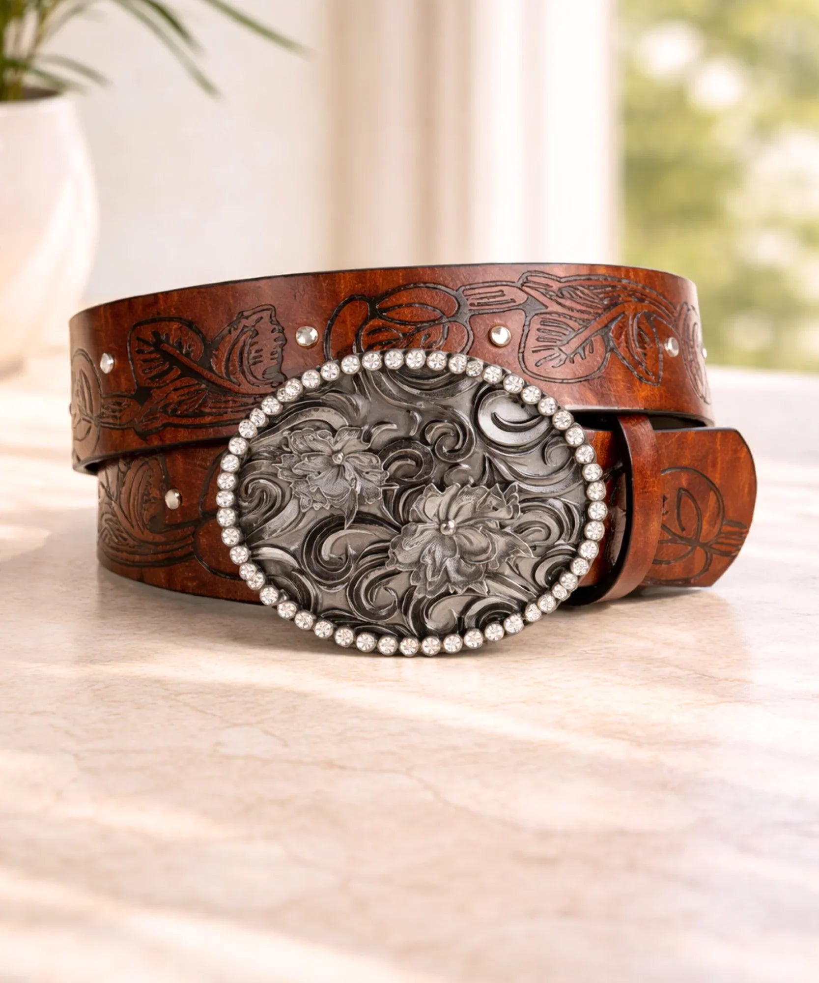 Women's cowgirl belt in embossed brown vegan leather with silver oval western buckle