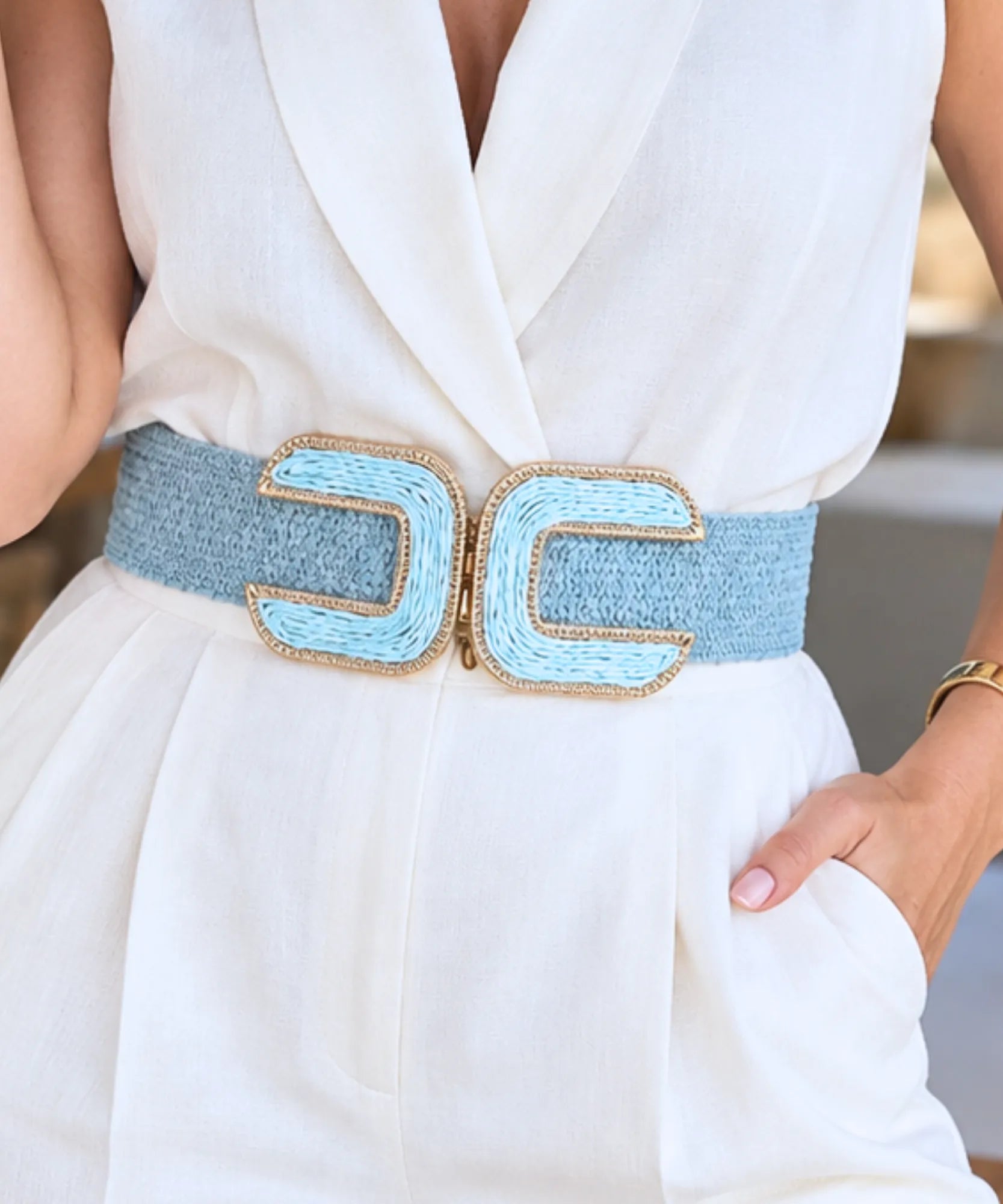 Women's wide elastic belt in light blue with gold-trimmed double buckle