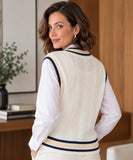 Back view of a women's ivory cable knit sweater vest