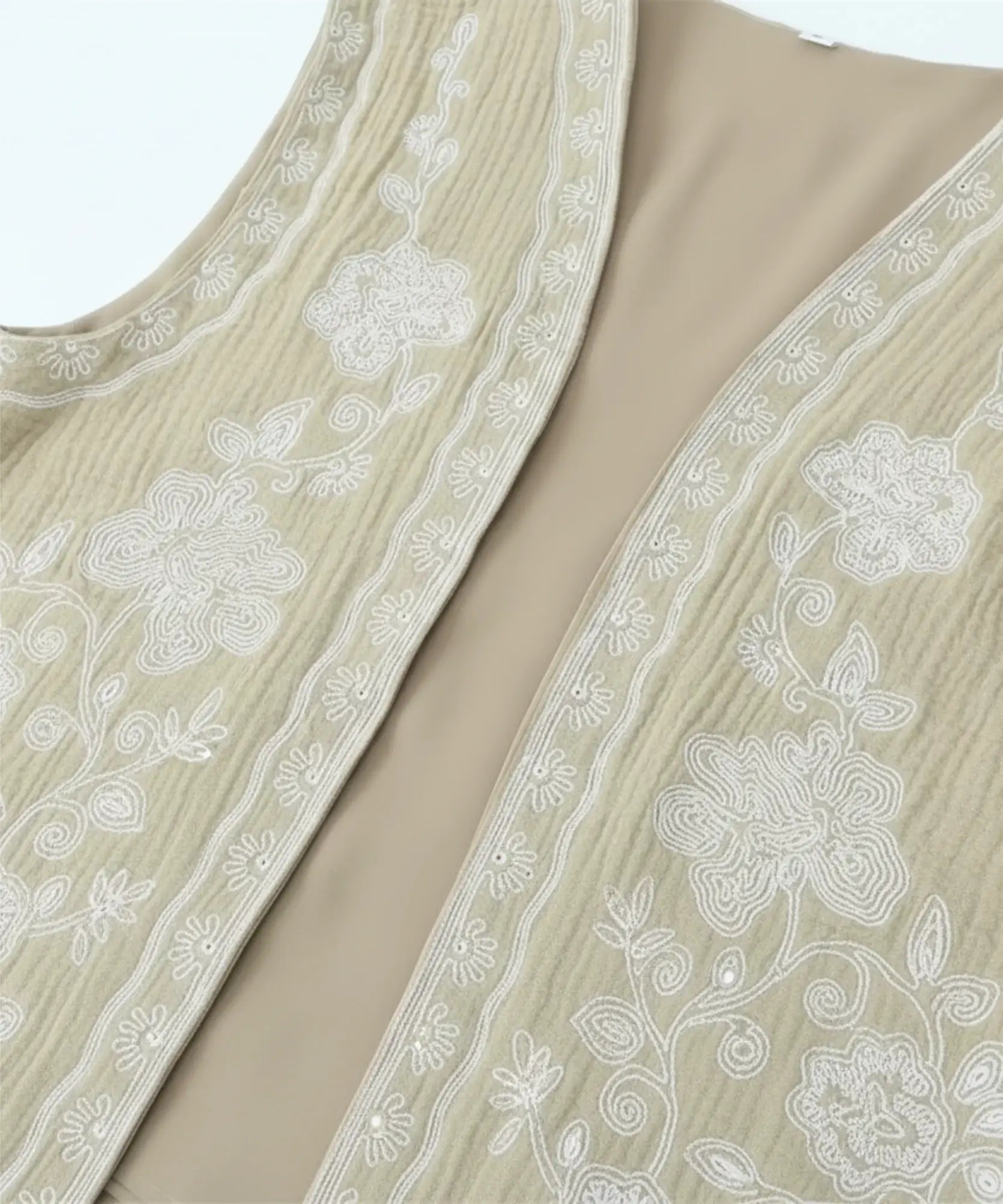 Women's floral embroidered cropped vest in champagne, embroidery detail