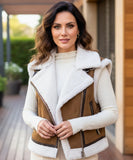Women's leather moto vest in brown with ivory shearling collar, side view