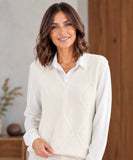Women's cable knit V-neck sweater vest in ivory, front view