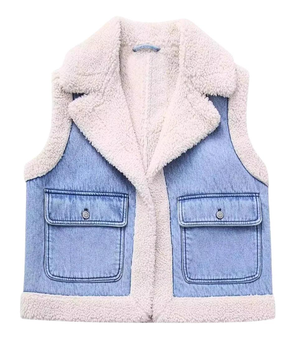 Women's sherpa-lined denim vest in blue, close-up detail