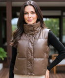 Women's leather puffer vest in brown, styled look