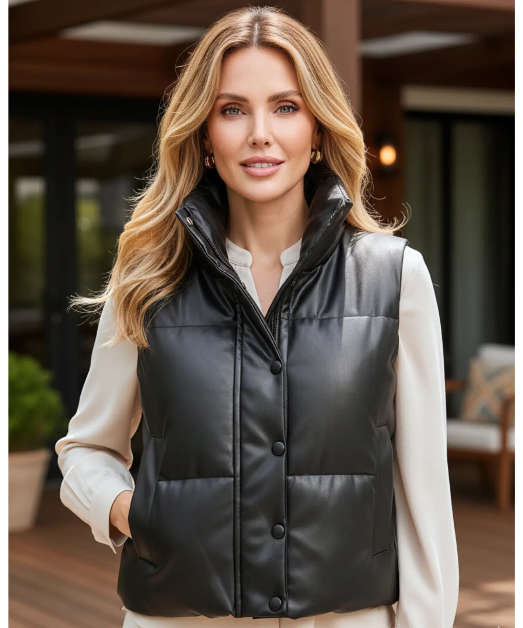 Women's leather puffer vest in black, detail of quilted texture