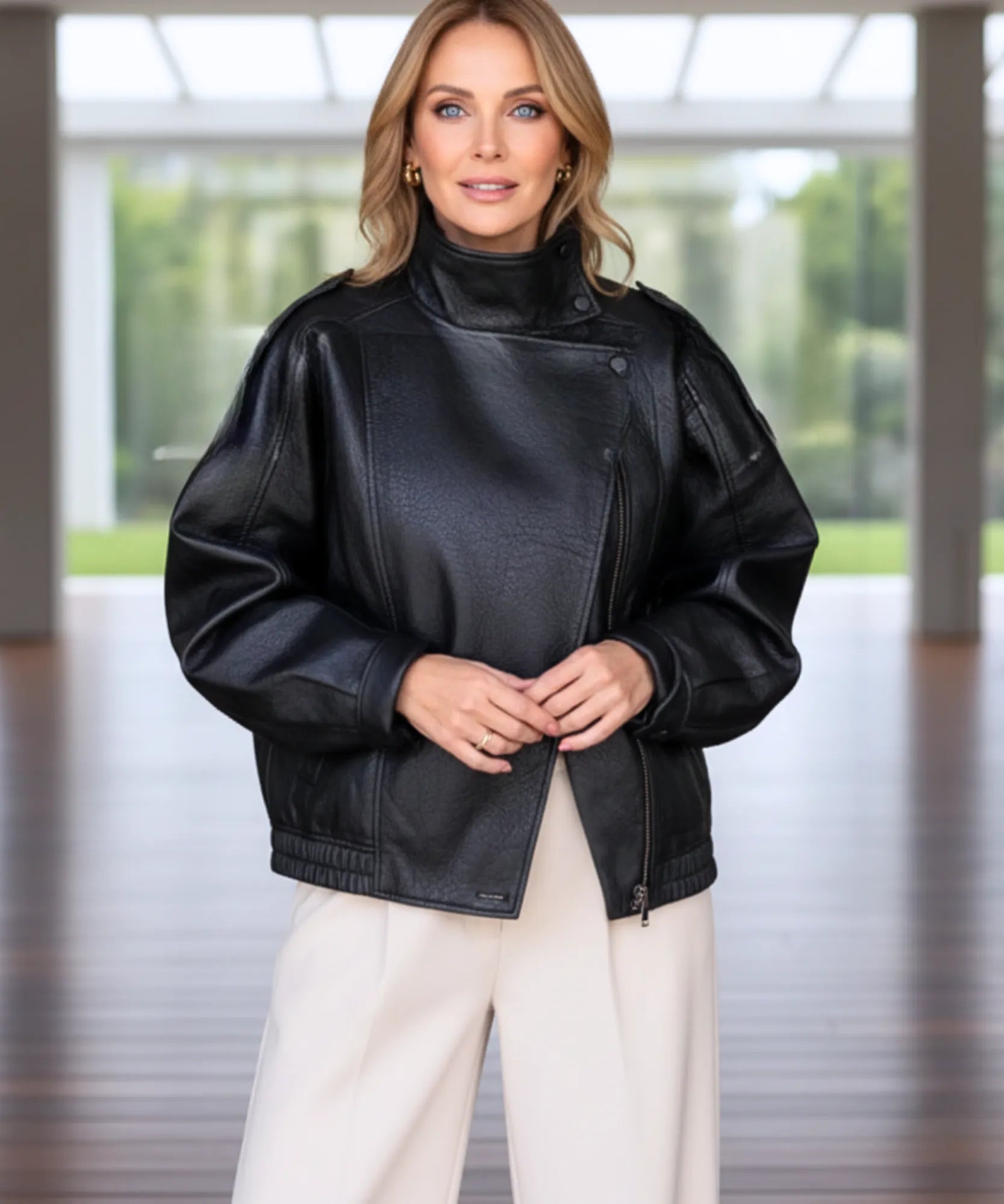 Side profile of the black asymmetrical leather jacket