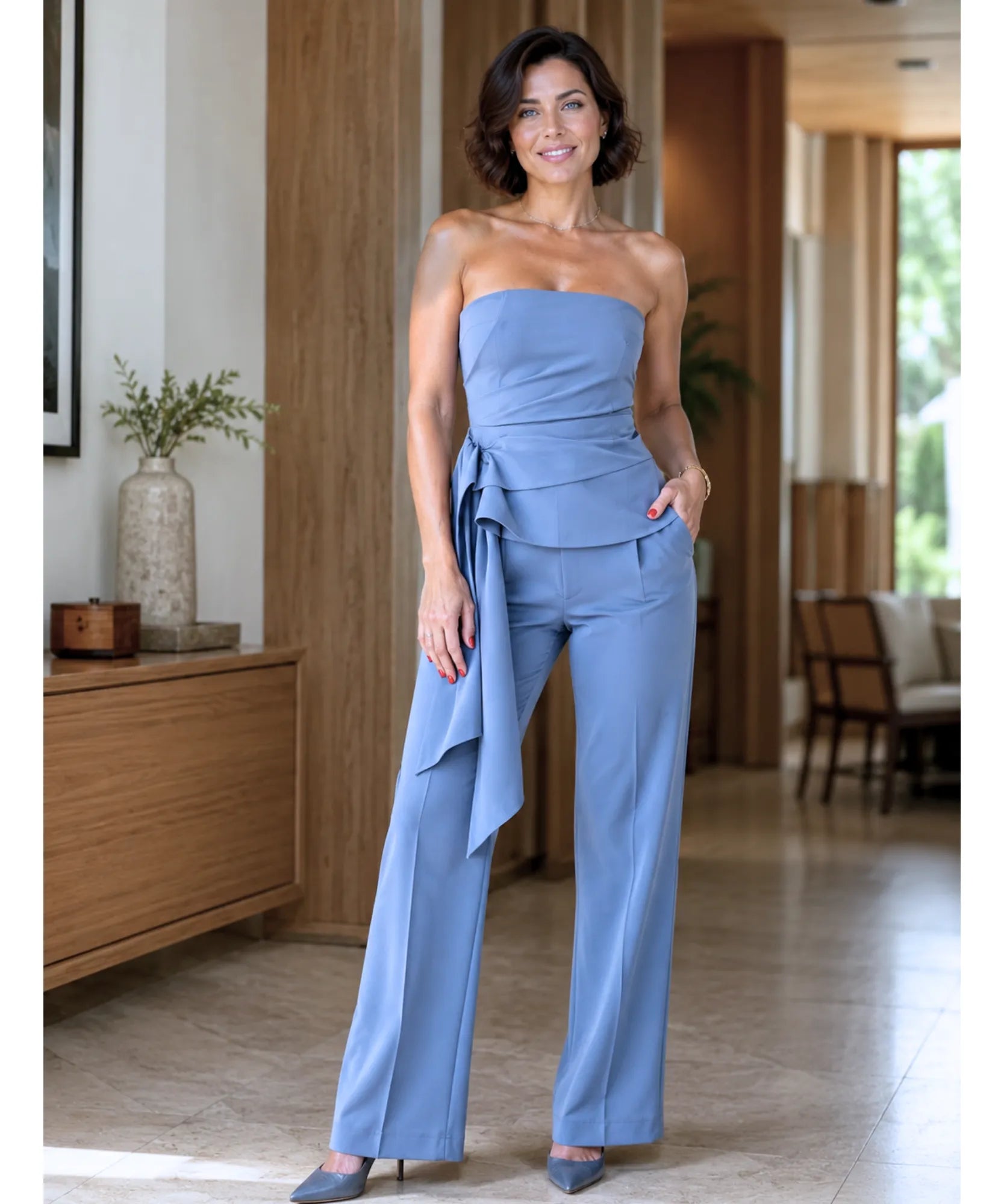 Women's tailored halter top and pants set in light blue, close-up detail