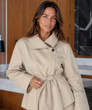 Women's belted blazer and shorts set, full-length view