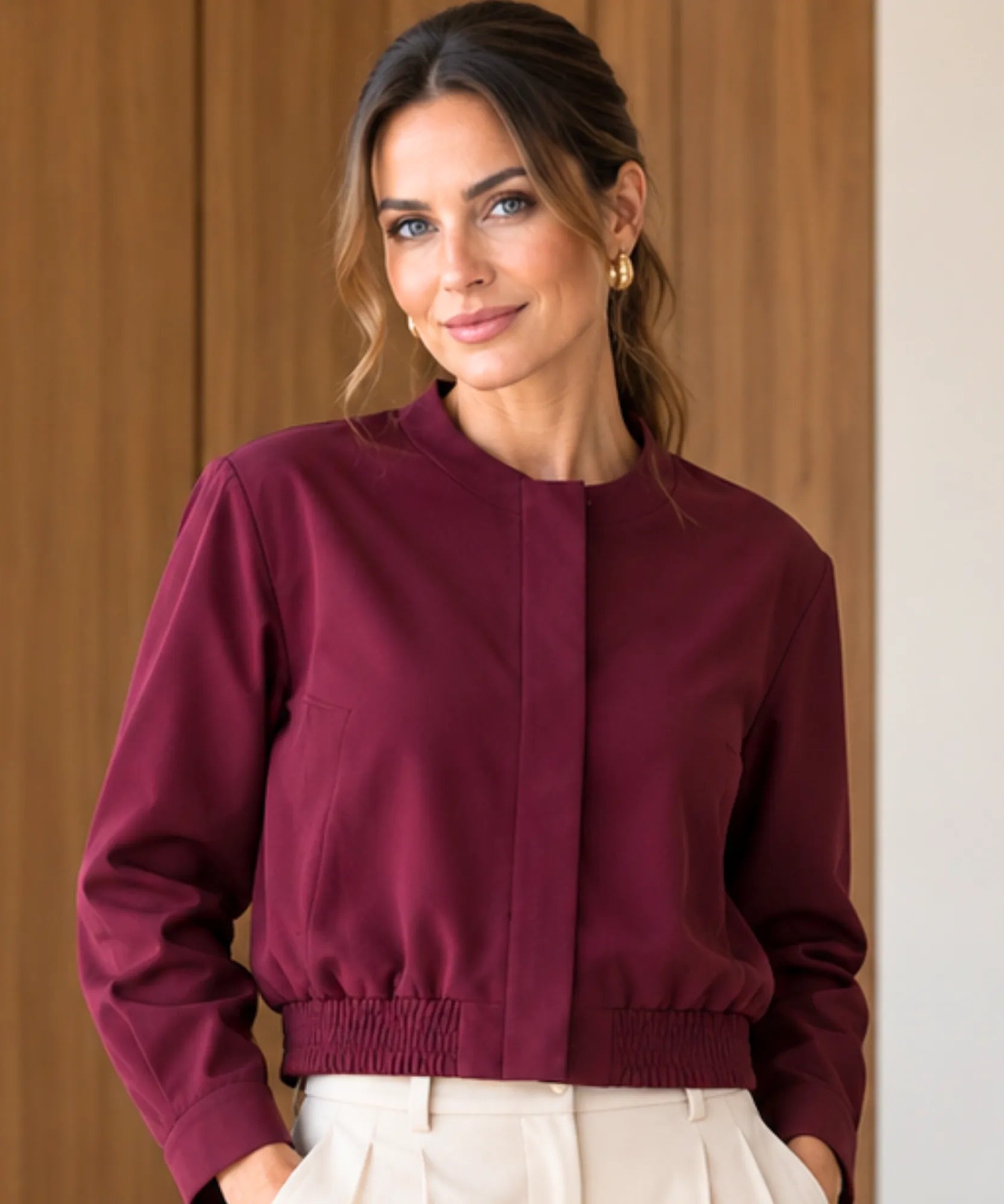 Close-up of the mandarin collar and zip-front jacket
