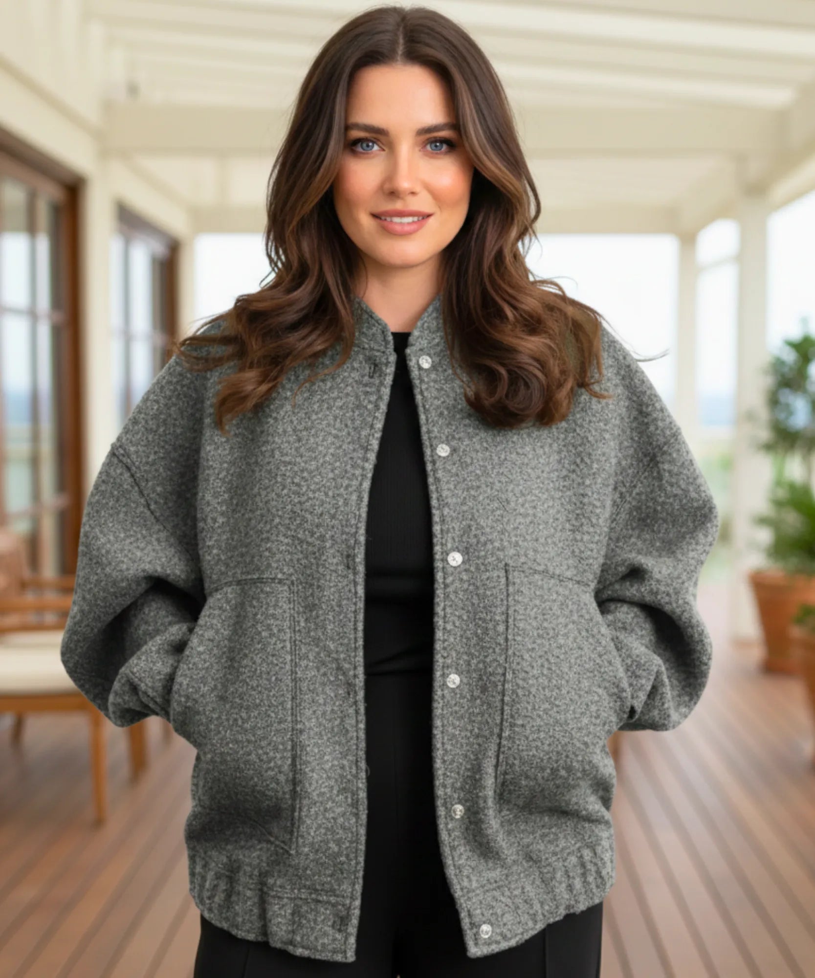 Front view of the oversized boucle bomber jacket in grey