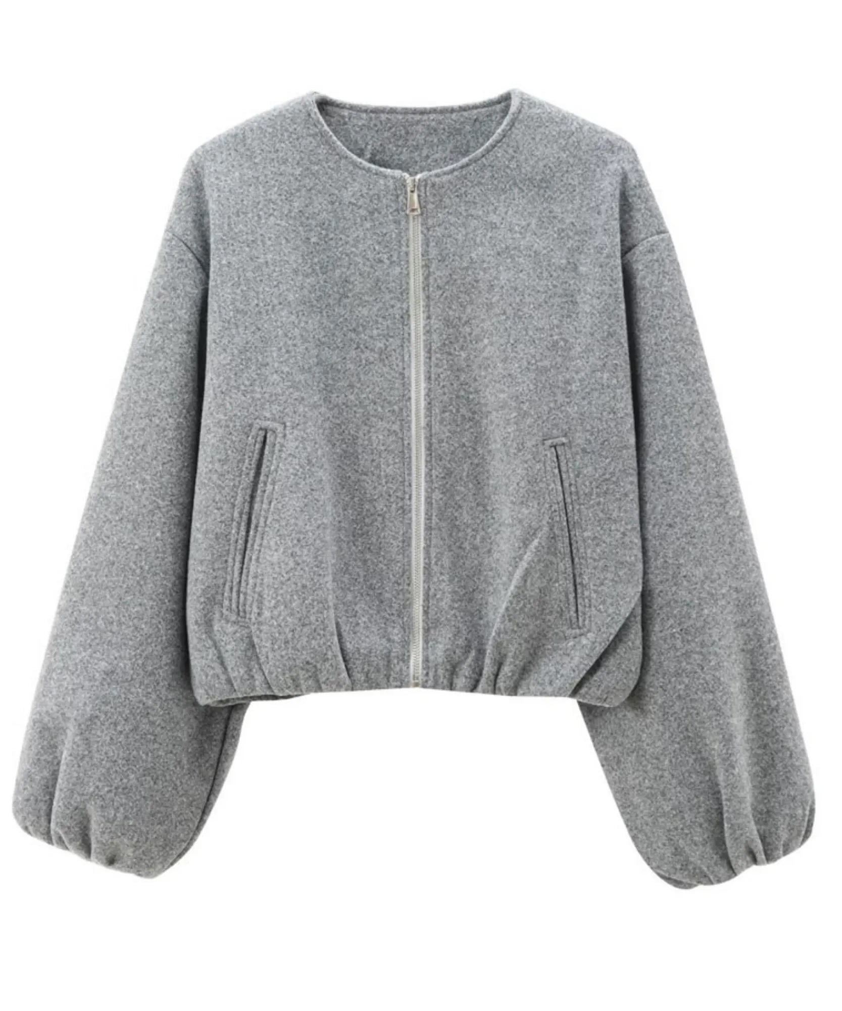Close-up of the grey wool bomber jacket and balloon sleeve