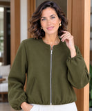 Woman wearing a cropped wool bomber jacket in olive green