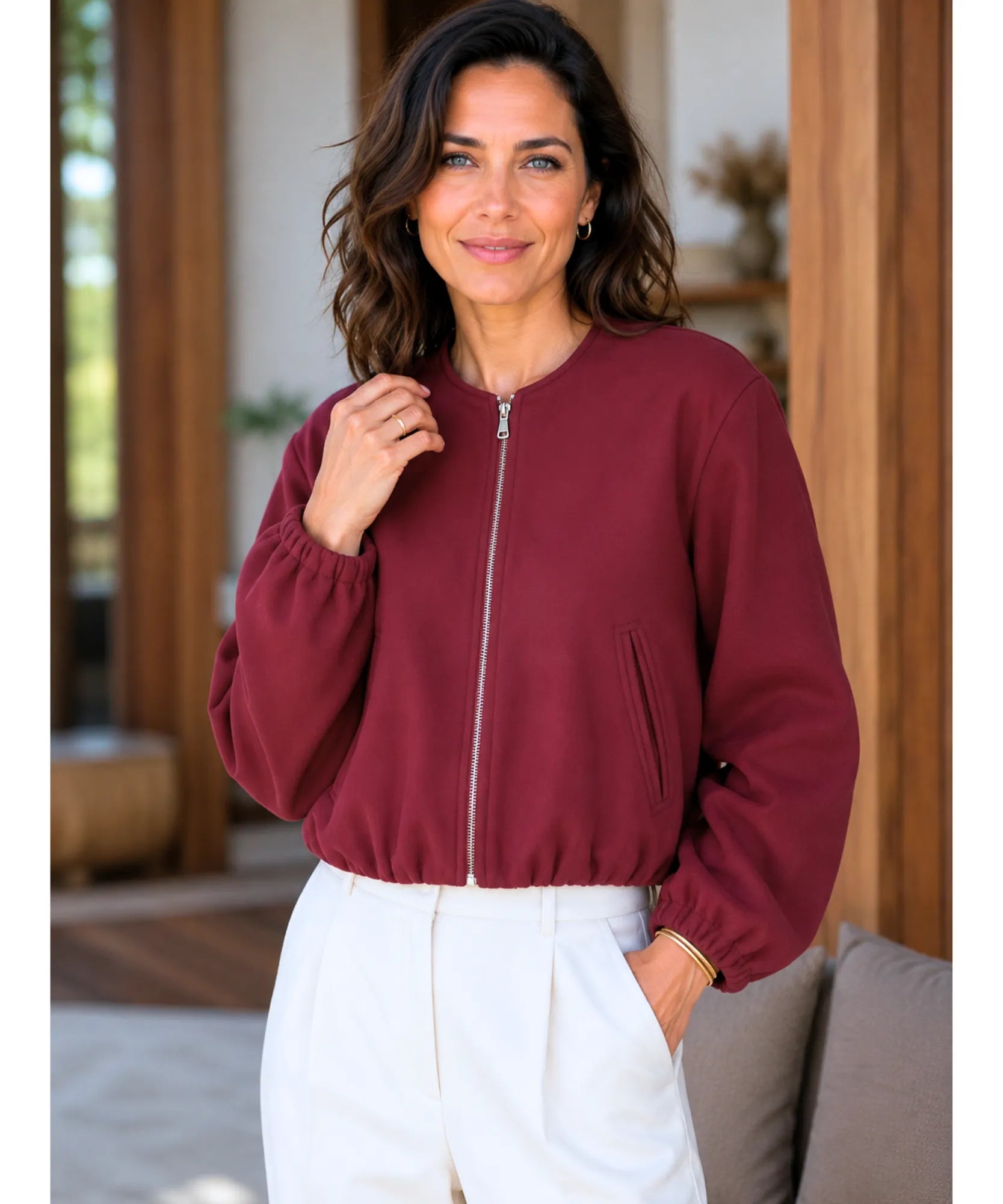 Front view of the cropped wool bomber jacket in burgundy