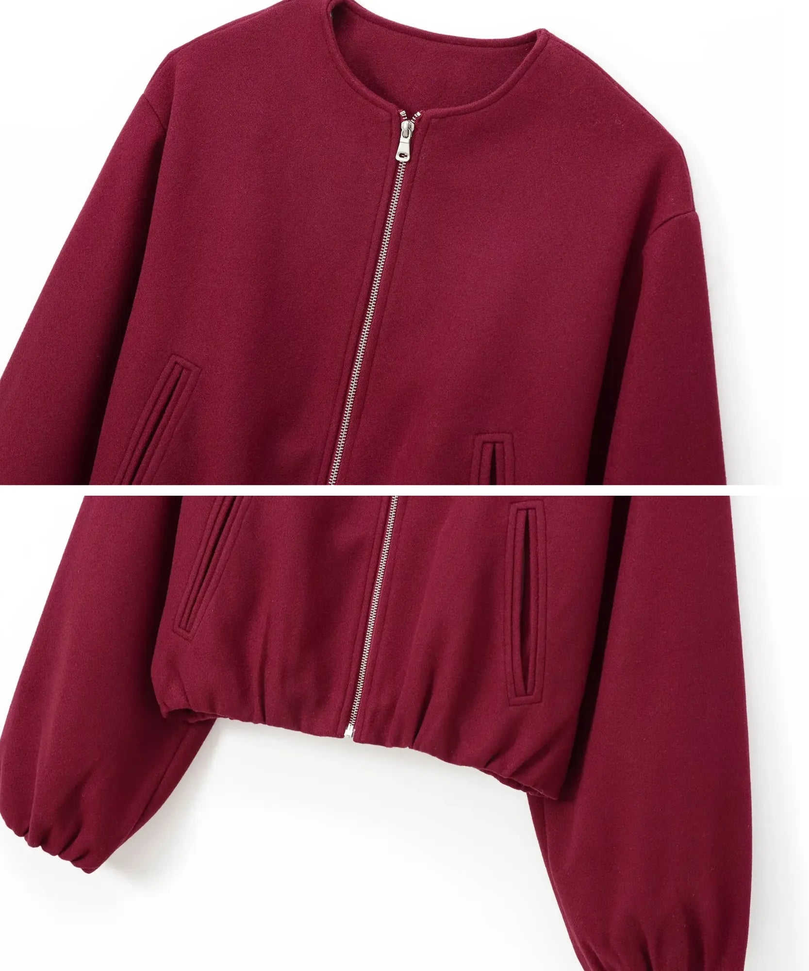 Detail of the zipper on the burgundy wool bomber jacket