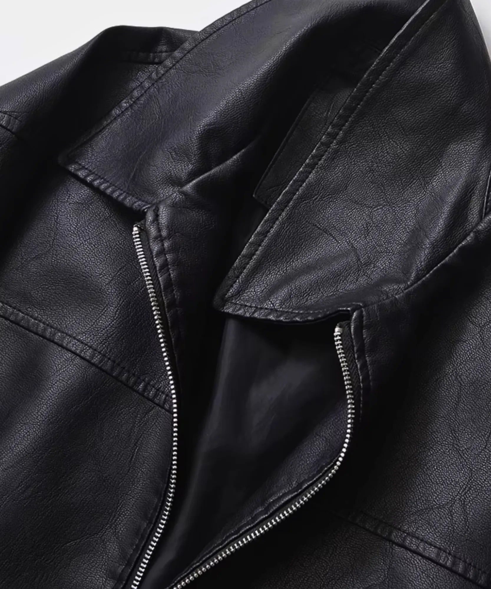 Women's boxy oversized leather jacket in black, pocket detail