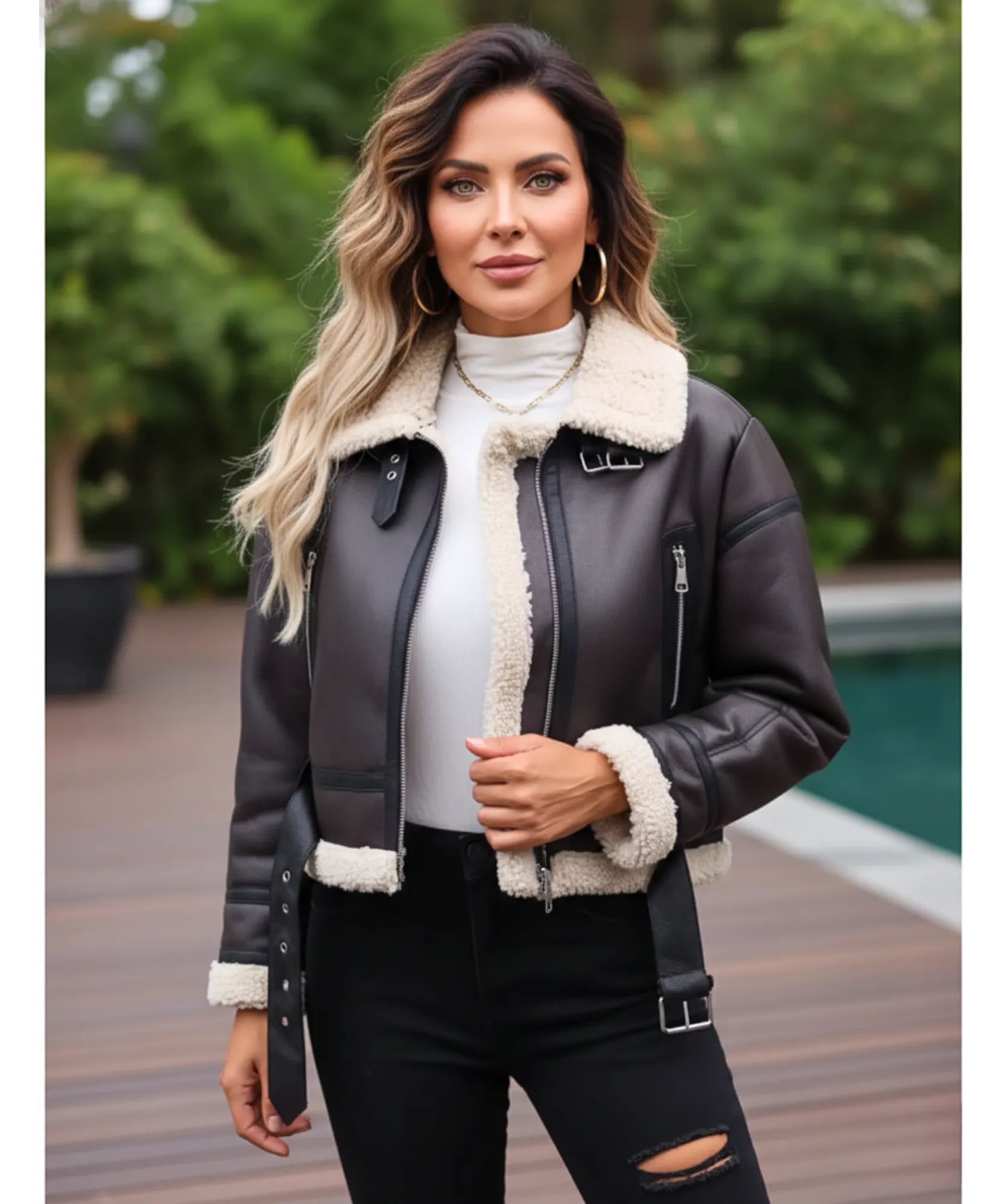 Women's high collar leather jacket in black, close-up texture