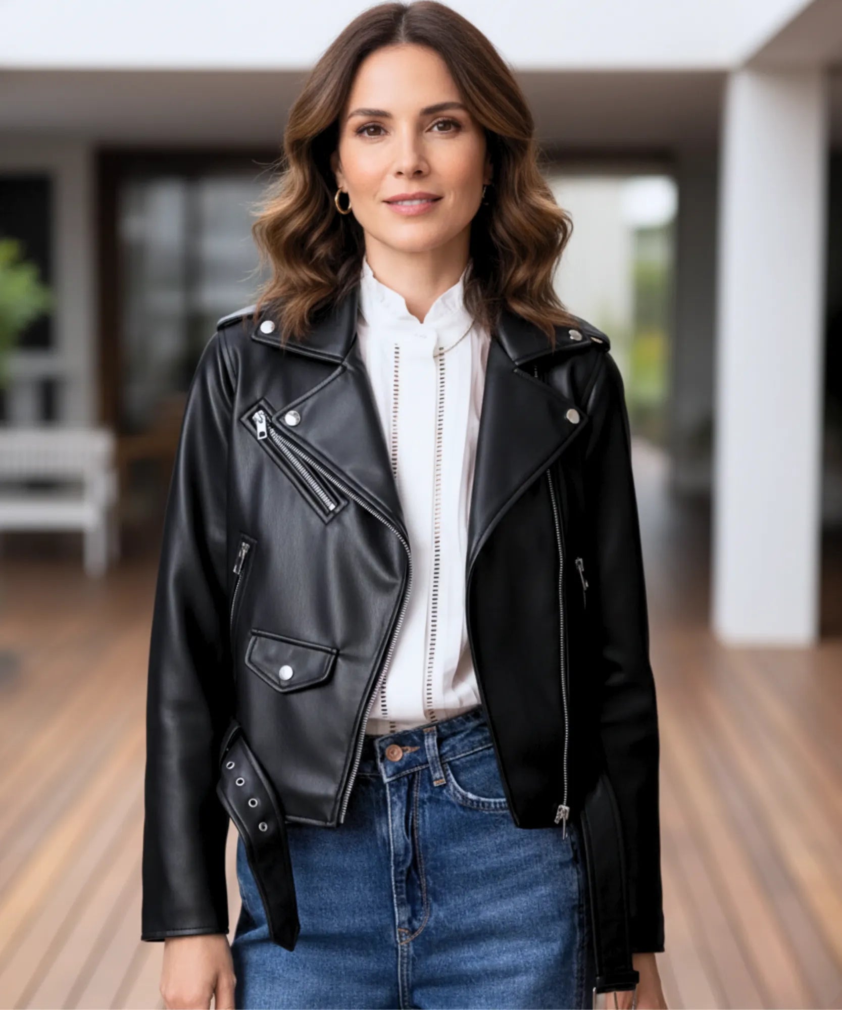 Women's leather biker jacket in black, styled look
