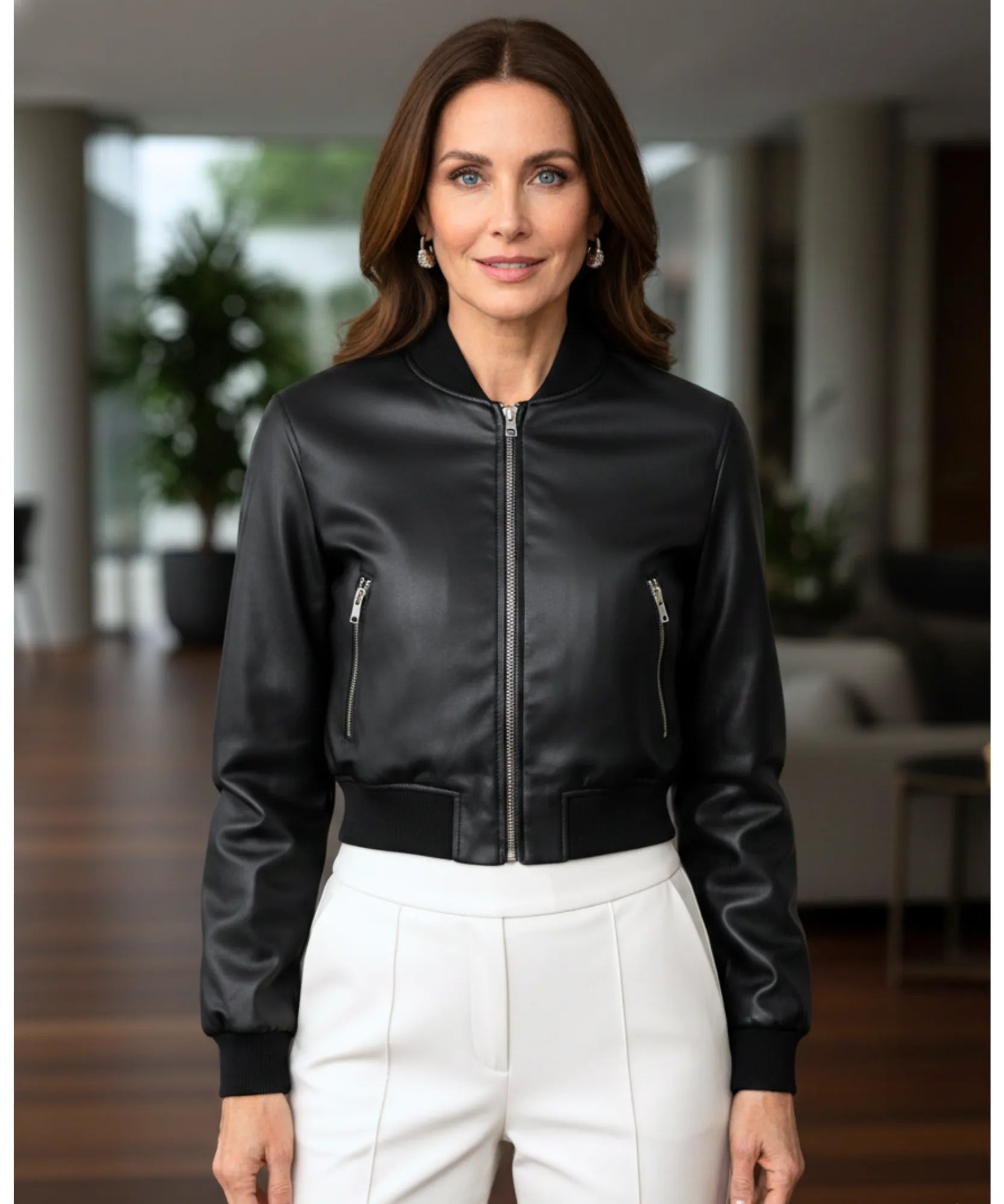 Women's leather bomber jacket in black, front view