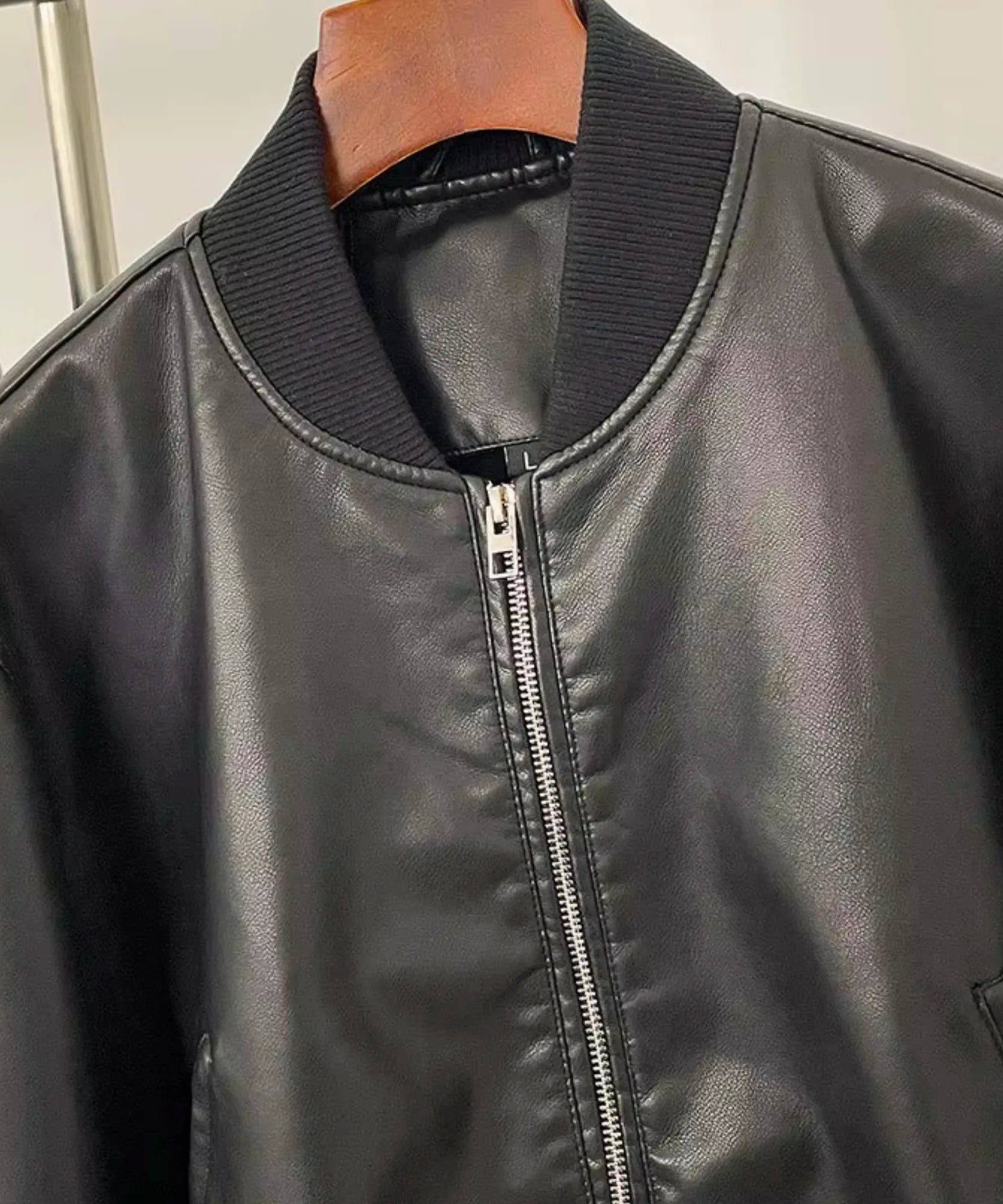 Women's leather bomber jacket in black