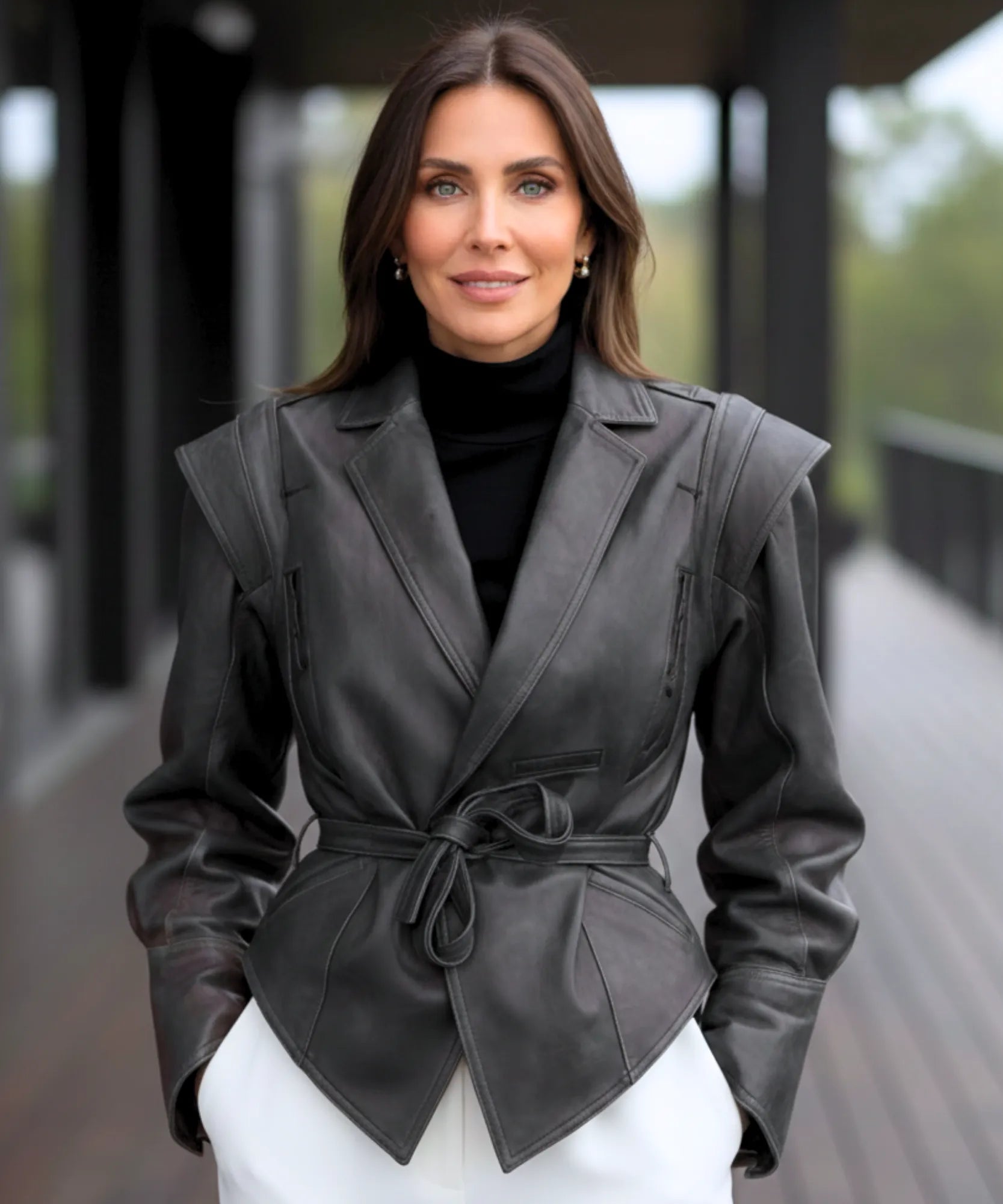 Women's belted leather jacket in black, styled look