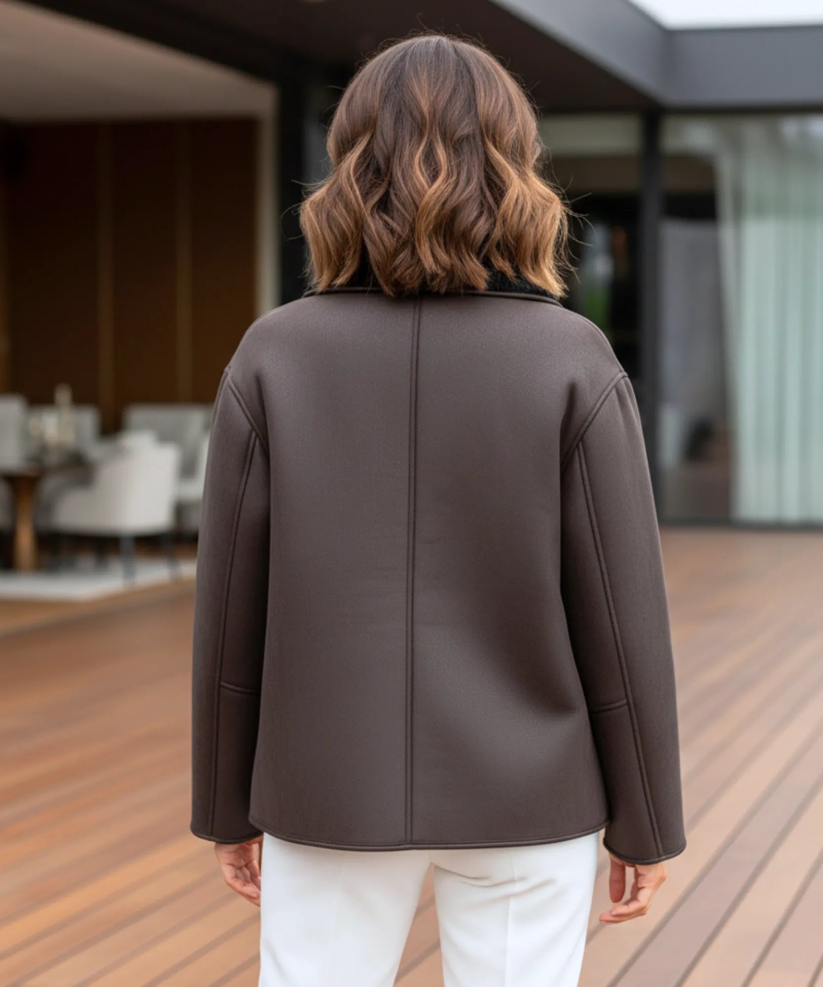 Women's dark brown vegan leather aviator jacket, close-up of cuff