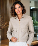 Women's wool jacket with gold zipper and structured collar in ivory