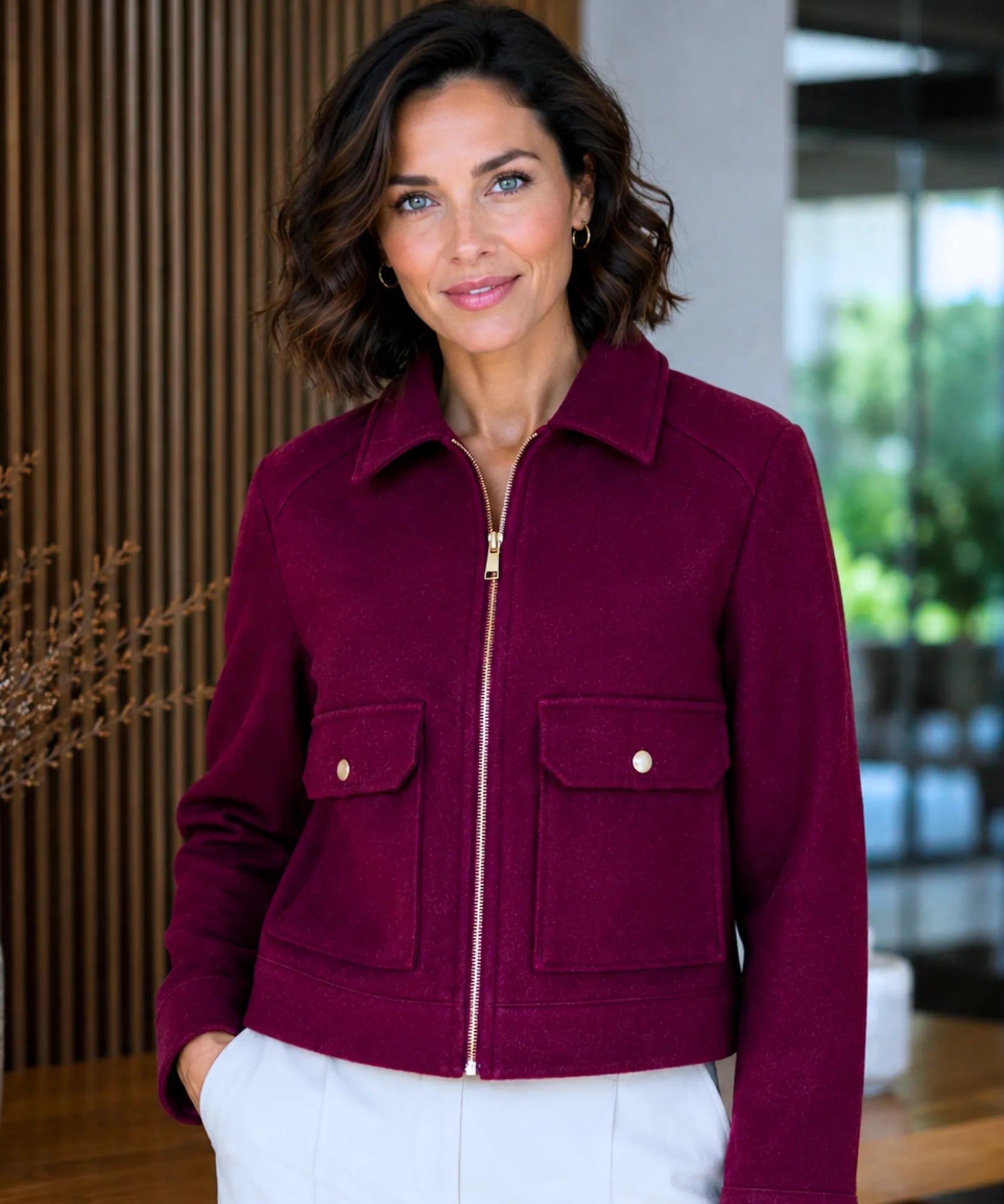 Close-up of the structured collar on the burgundy wool jacket