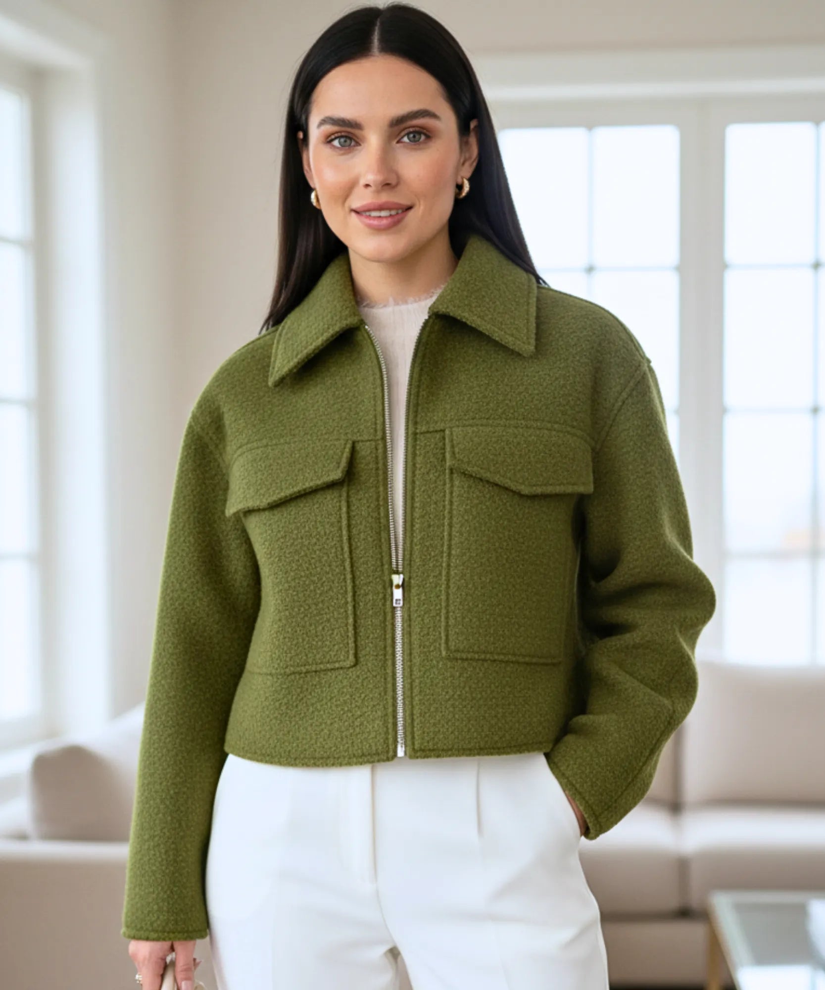 Women's oversized bouclé jacket in olive green, close-up texture