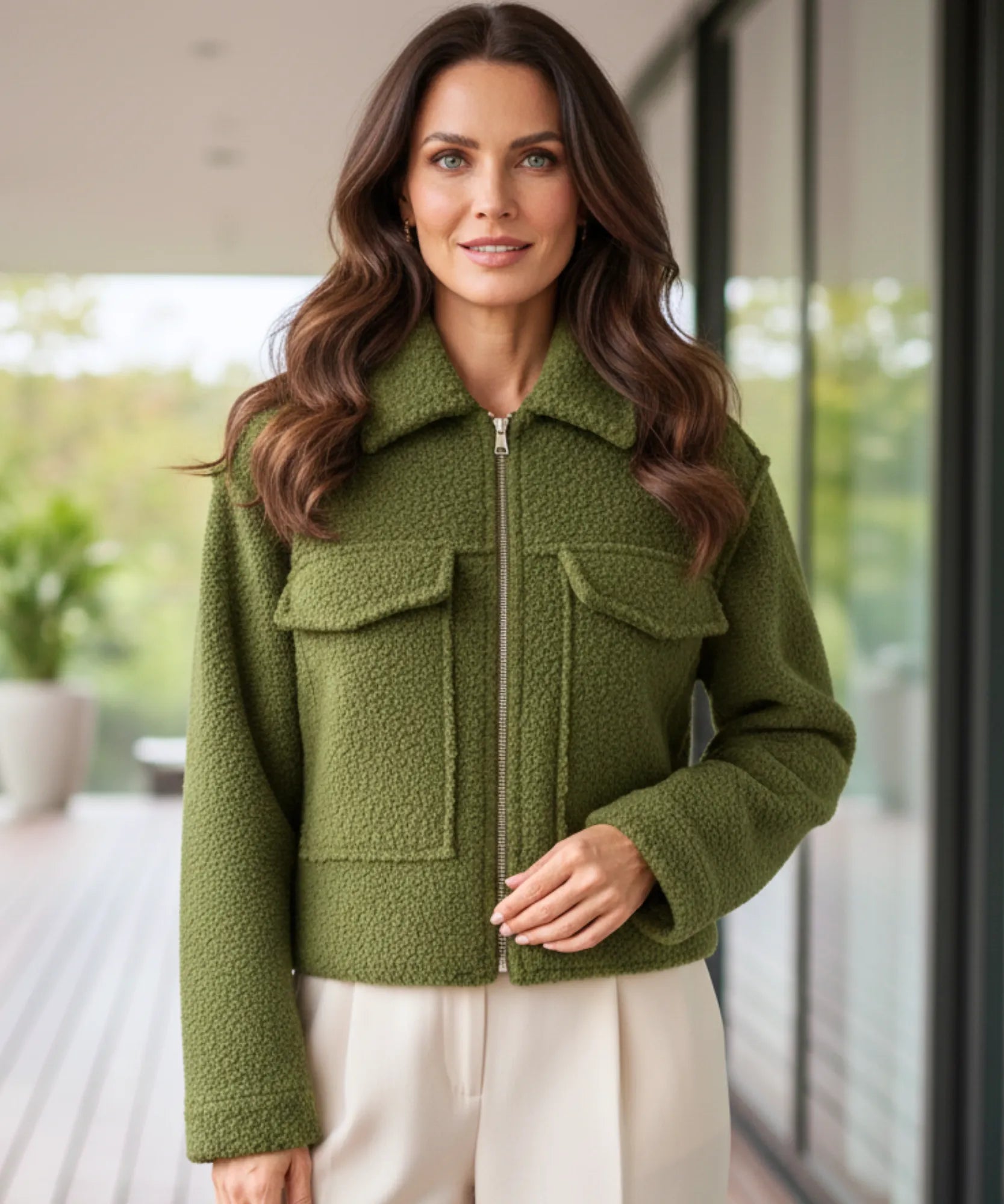 Women's oversized bouclé jacket in olive green, front view