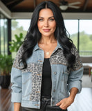 Woman wearing an oversized leopard print denim jacket in blue