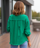 Women's green distressed oversized denim jacket, front view
