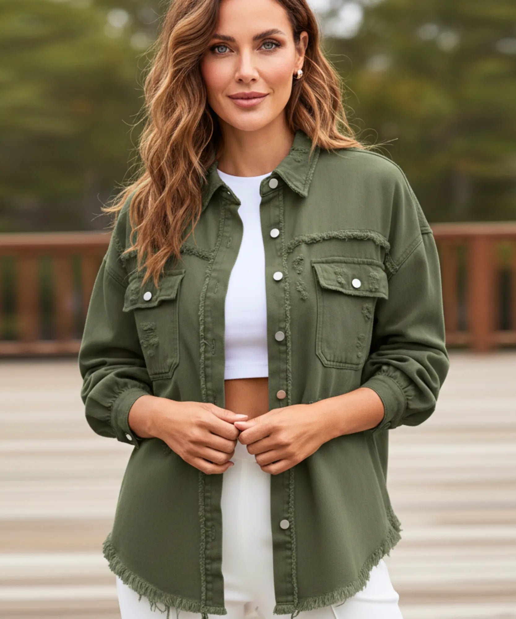 Women's green distressed oversized denim jacket, detail view