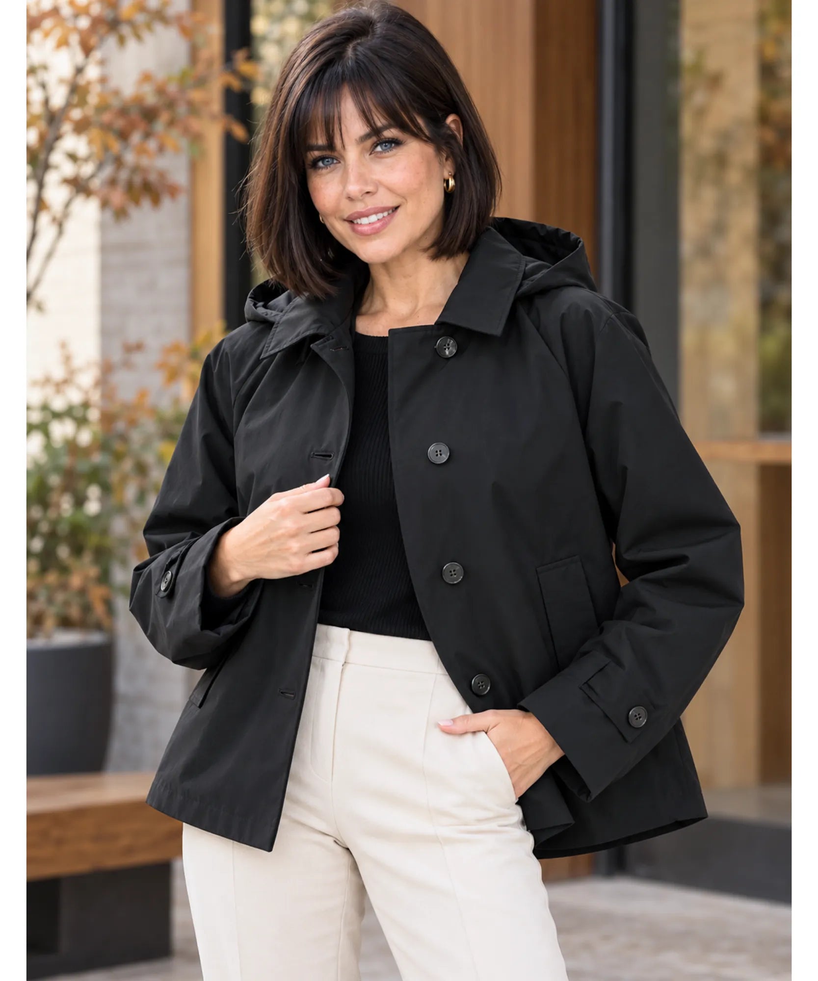 Women's utility jacket in black over a black top